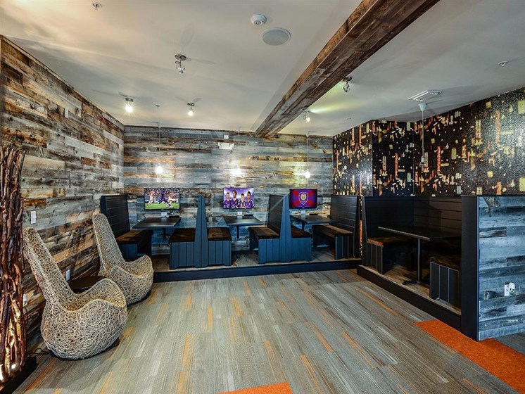 Two Custom Designed Caves with Media Zones to catch all the sports and entertainment action without ever leaving the property at EOS Apartments, Orlando, FL 32826