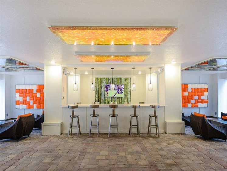 Clubhouse Bar with Flat Screen TV for Resident Entertainment Use at EOS Apartments, Orlando, FL 32826