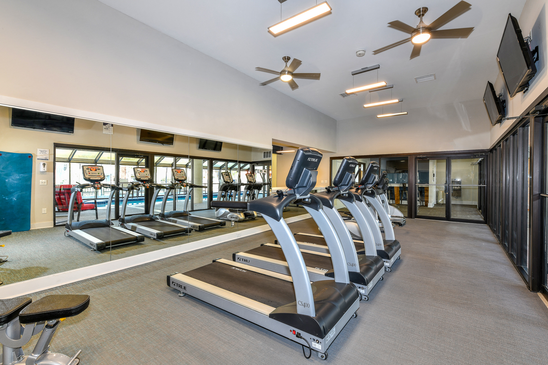 Fitness center with cardio equipment at Waterford Place, Louisville, Kentucky