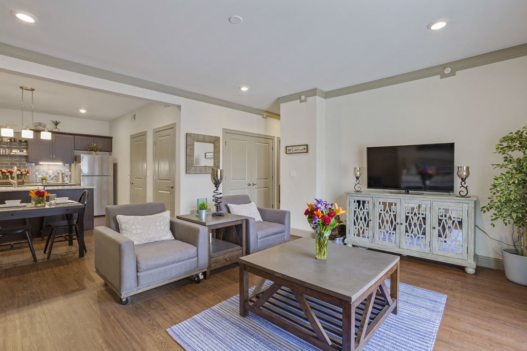 a living room with couches and a table