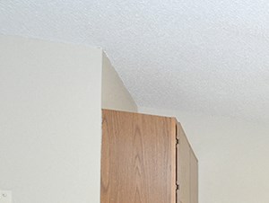 Open Layout Kitchens Kitchens with Open Layout Floor Plans and White Countertops and Oak Cabinetry