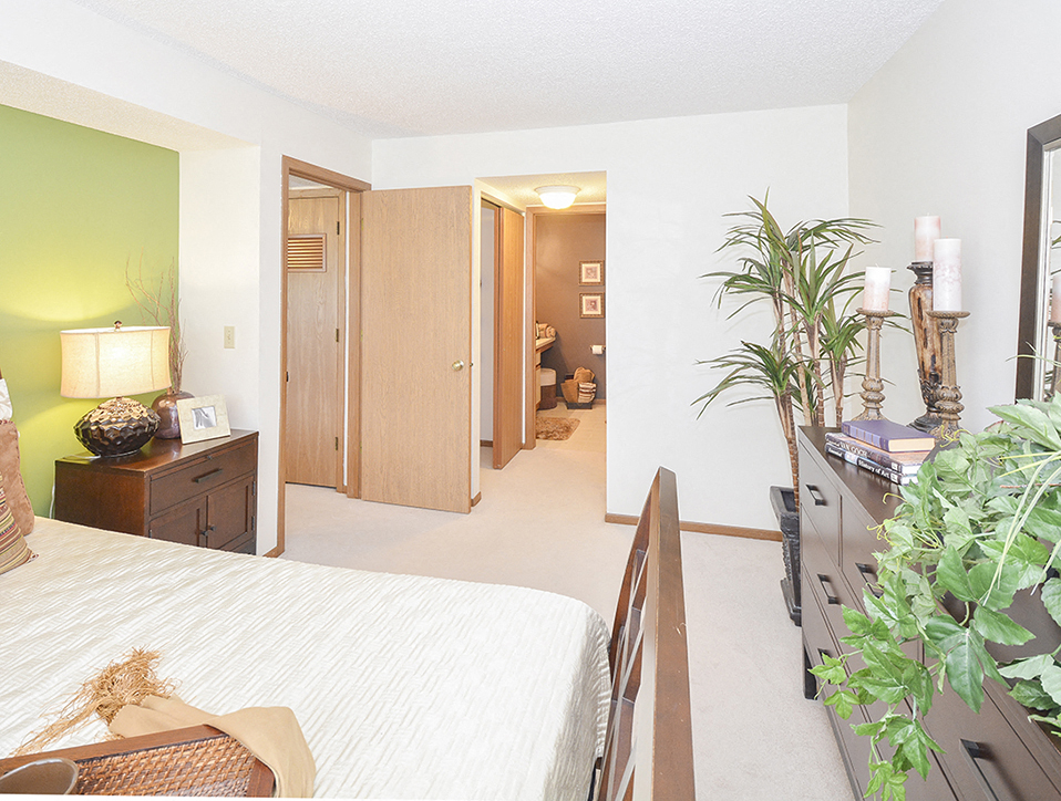 Bedroom with Walk-In Closet and Attached Bathroom