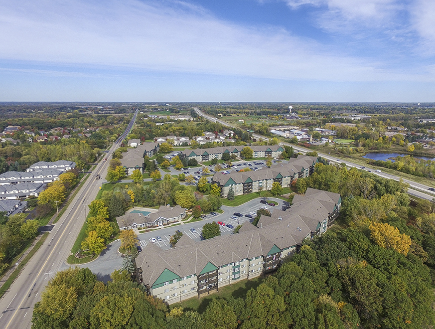Ariel View of the White Bear Woods Apartment Community Nestled In Amongst the Trees