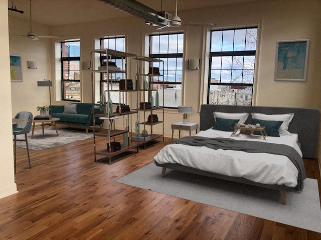 a bedroom with a bed in the middle of a room