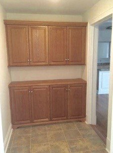 Brown cabinets in a kitchen.