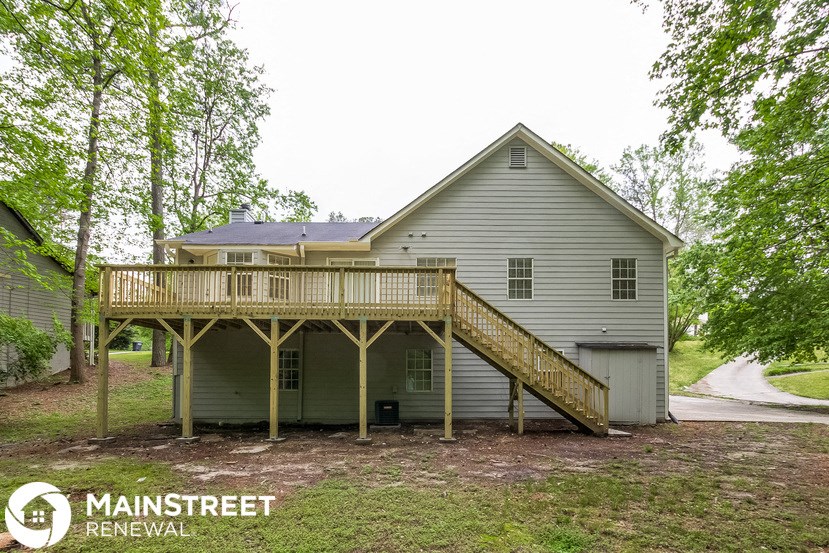 the view of the back of the house from the deck