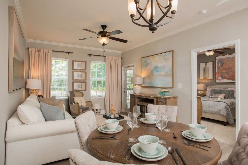 a living room with a couch and a table