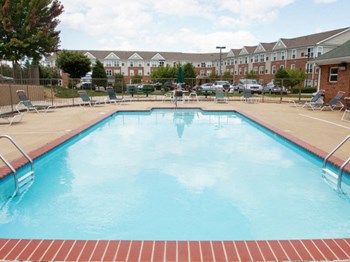 Pool with sundeck at Frontier Ridge Apartments