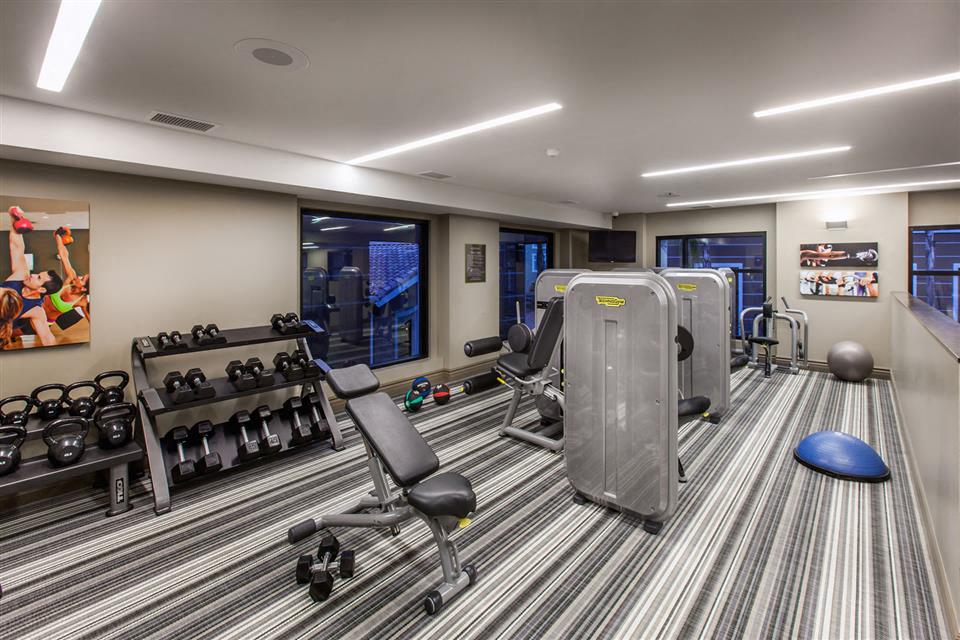 The Verdant Apartments fitness center with free weights in San Jose, CA