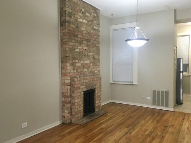 Exposed Brick Fireplace