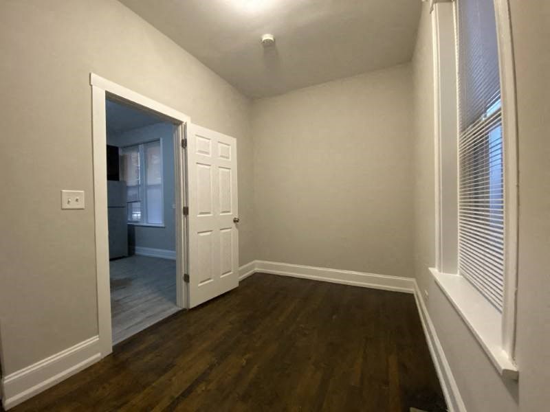 Bedroom with hardwood floors
