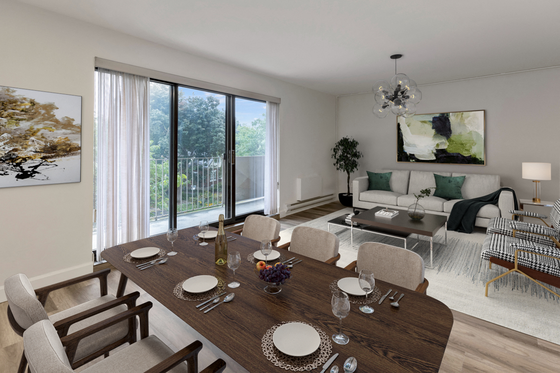 A dining room with a table set for a meal.