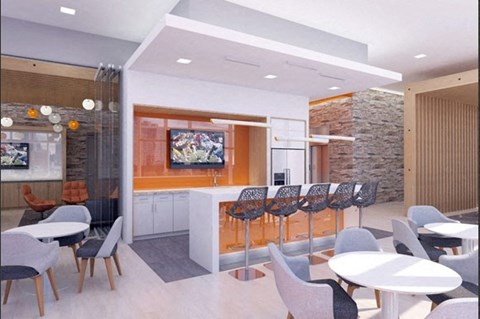 A modern dining room with white tables and chairs.