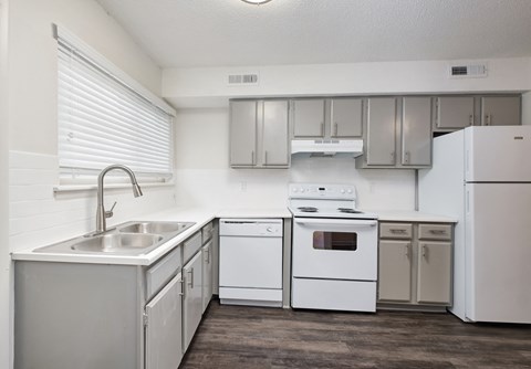 the preserve at ballantyne commons apartment kitchen with white appliances
