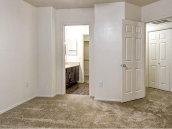 Ingleside Apartments Bedroom with wall to wall carpet and attached bathroom - Photo Gallery 20
