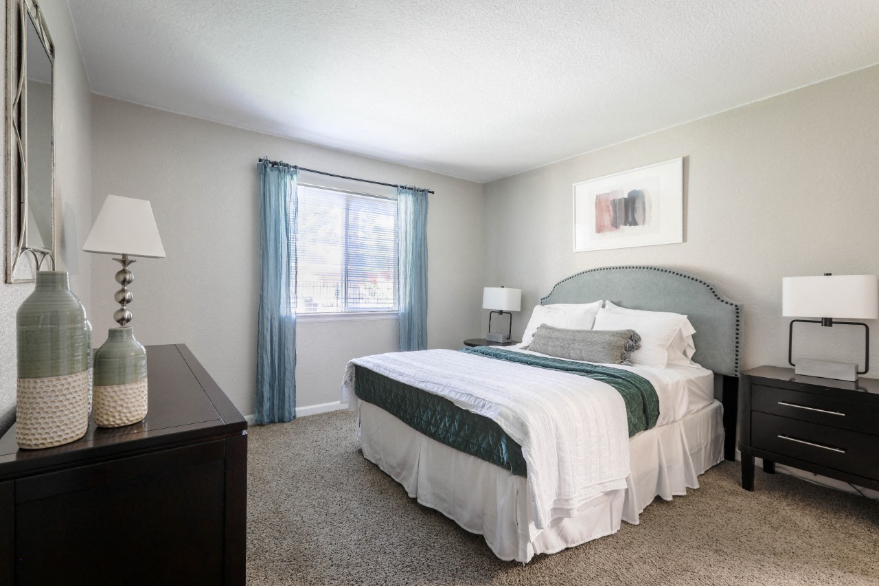 Copper Flats - Spacious Bedroom with Plush Carpeting and a Large Side Window