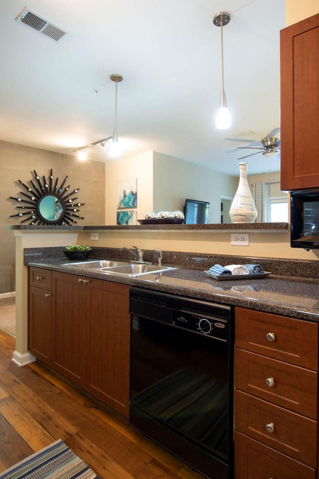 a kitchen with a sink and a dishwasher