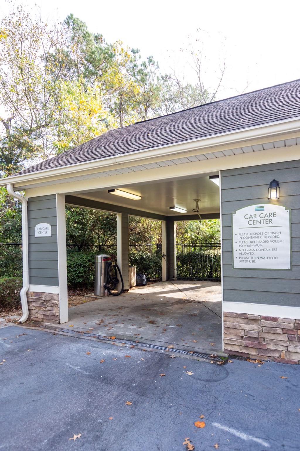 a green building with a sign on the front of it