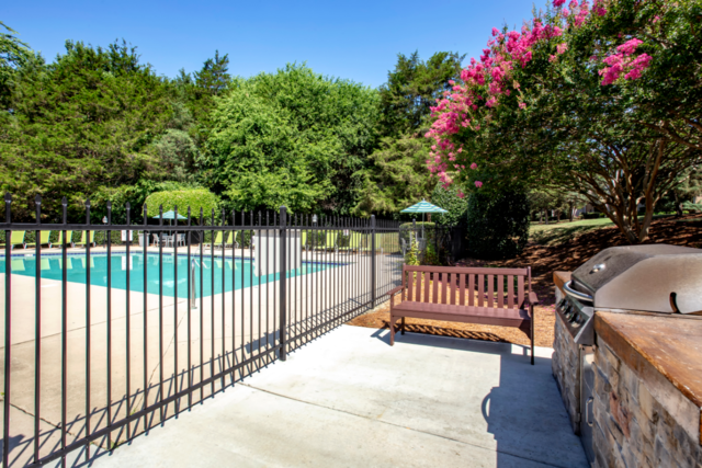 resort style pool with grilling area