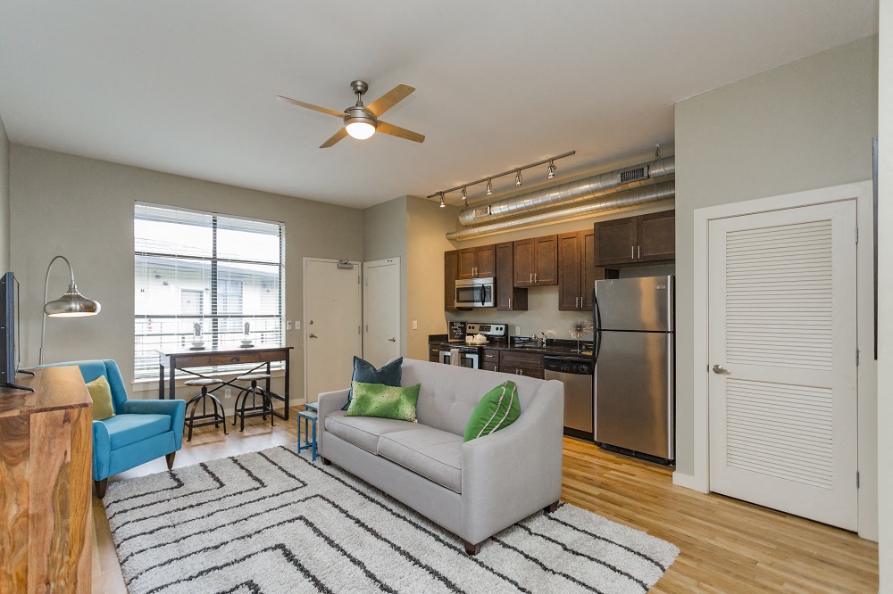 Gale Lofts Open Living Room with Dining Room and Kitchen Access