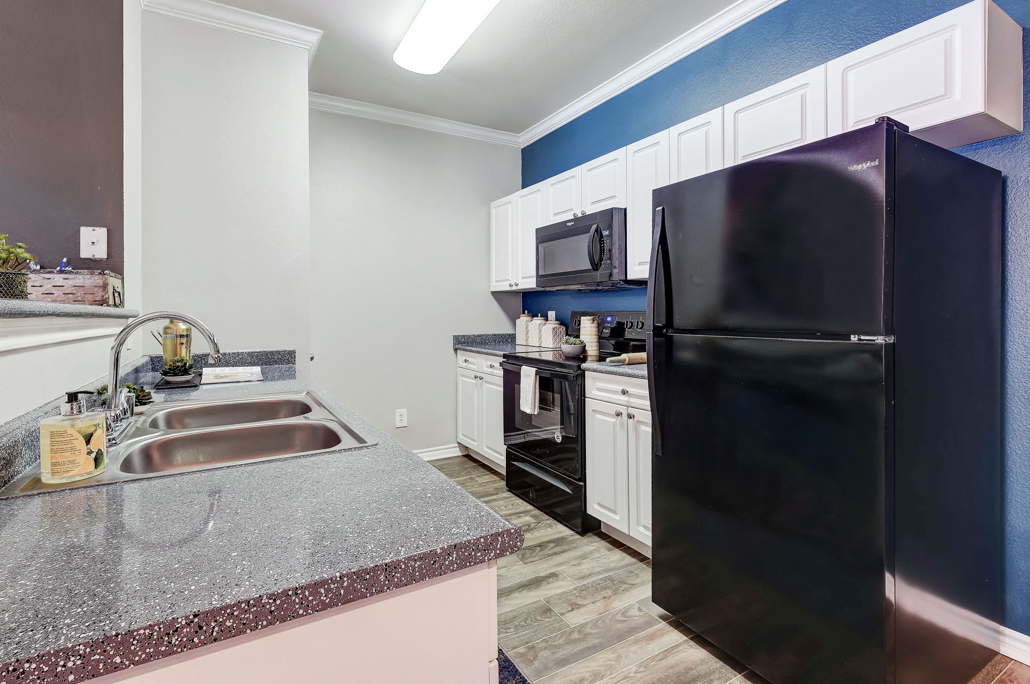 Eat In Kitchen with black appliances