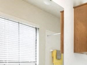 Bathroom with wood-style flooring and soaking tub/shower