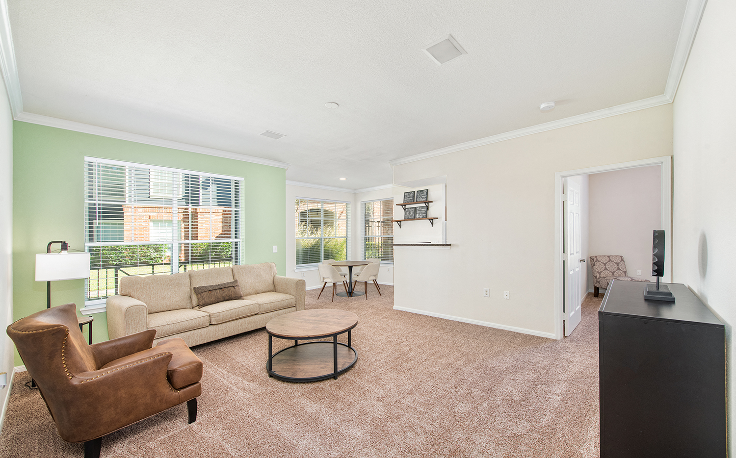 a living room with a couch and a table