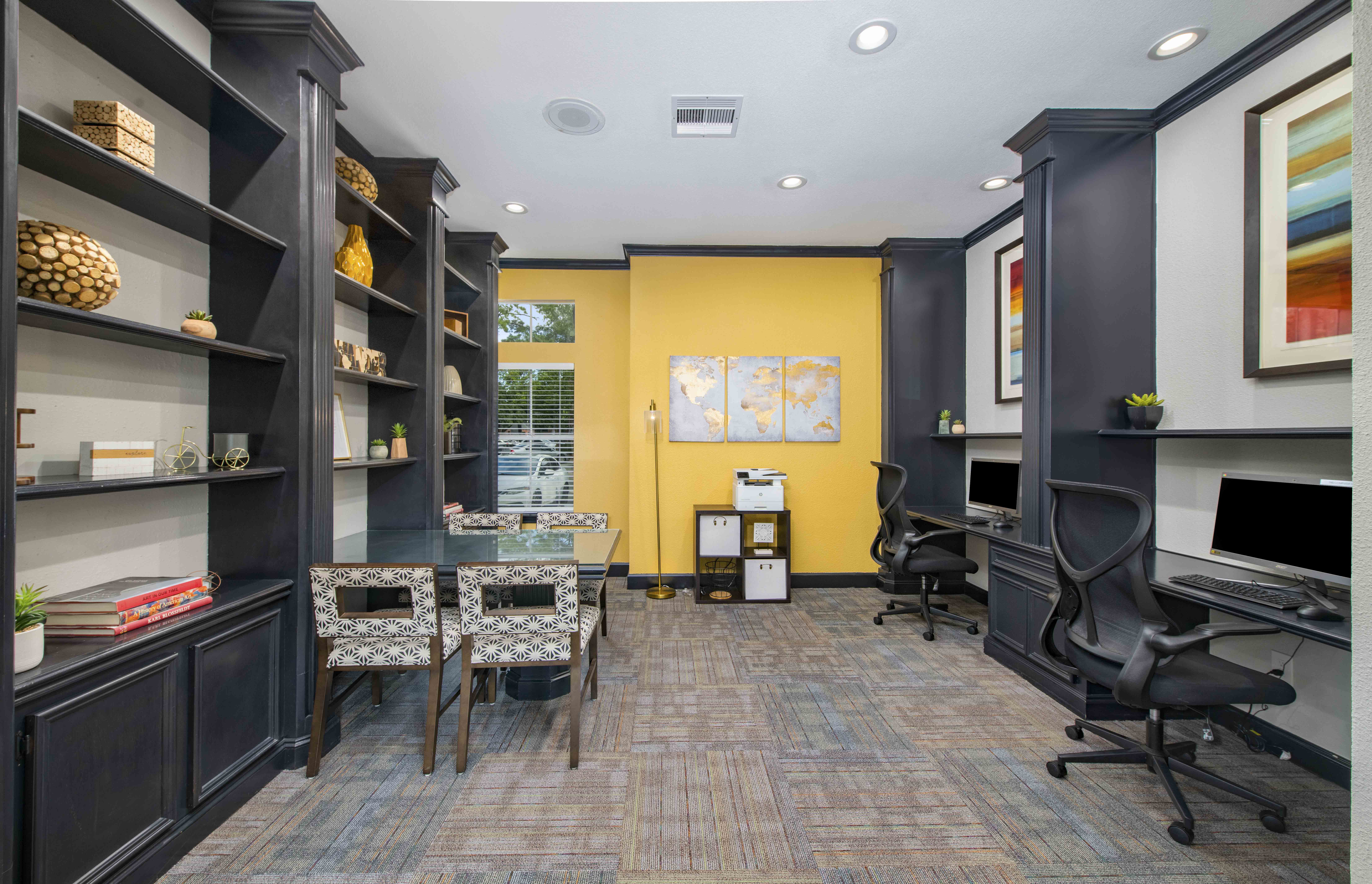 a home office with a desk and a computer