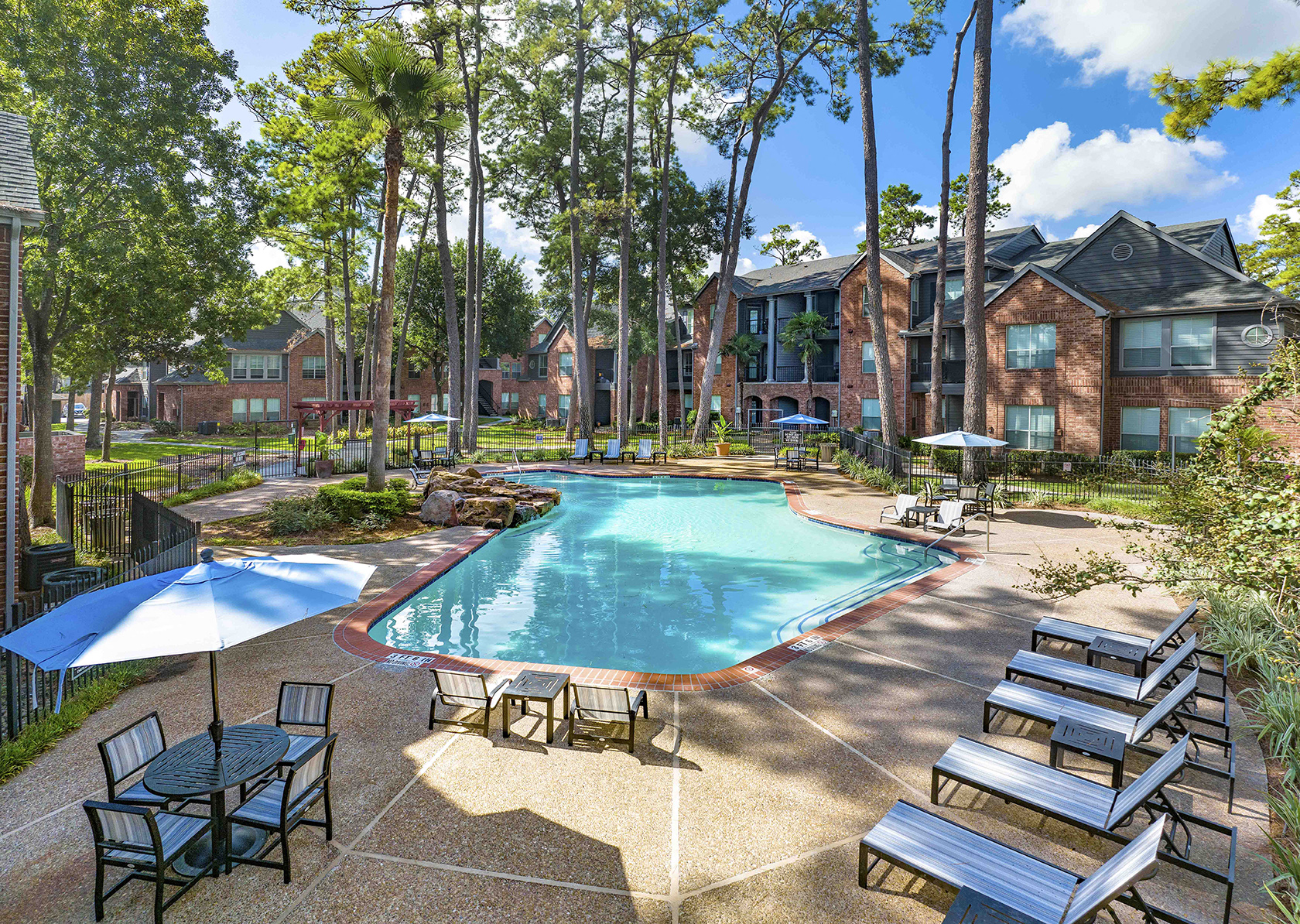 our apartments offer a swimming pool with chairs and umbrellas