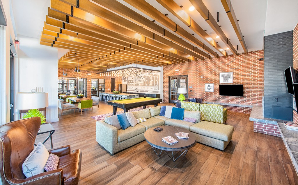 a living room with couches and a table