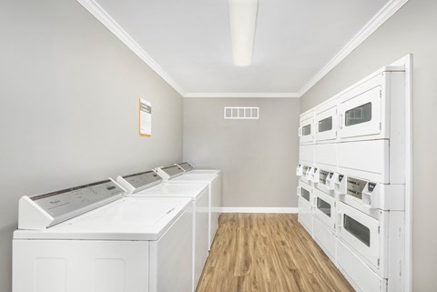 A laundry room with a washer and dryer.