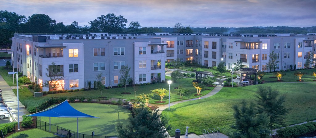 an aerial view of an apartment complex at night