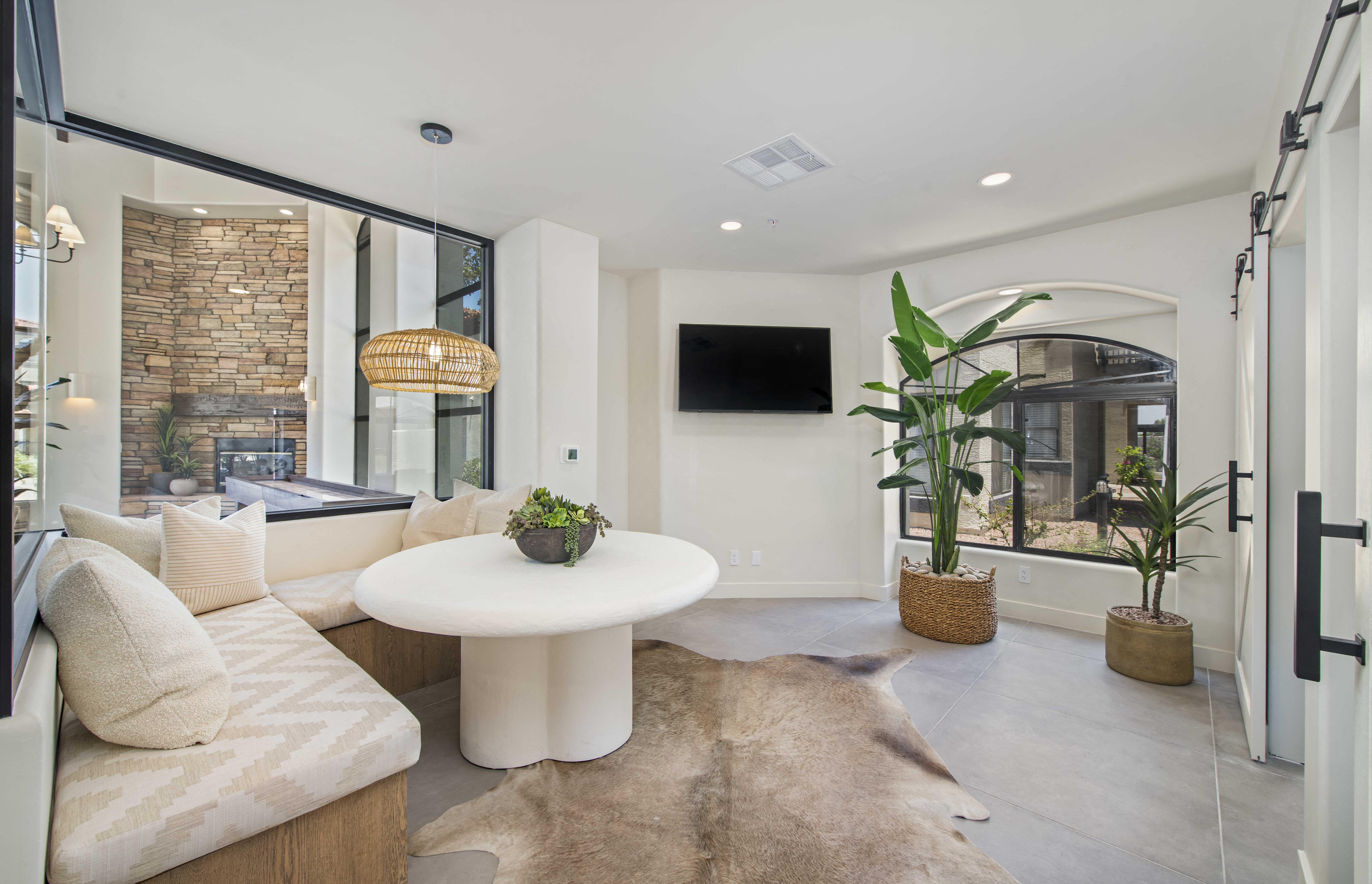 a living room with a couch and a table