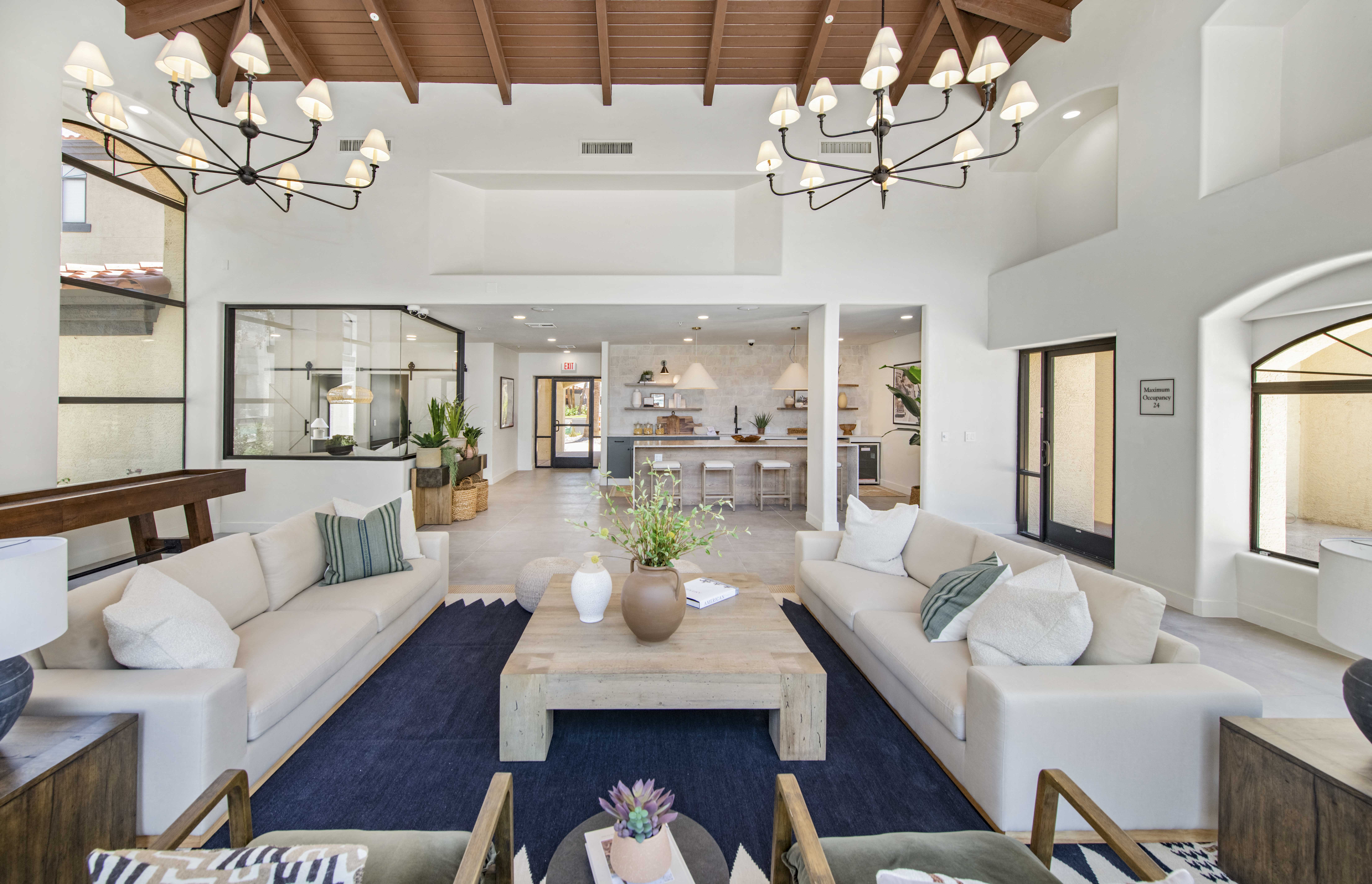 a living room with couches and a coffee table