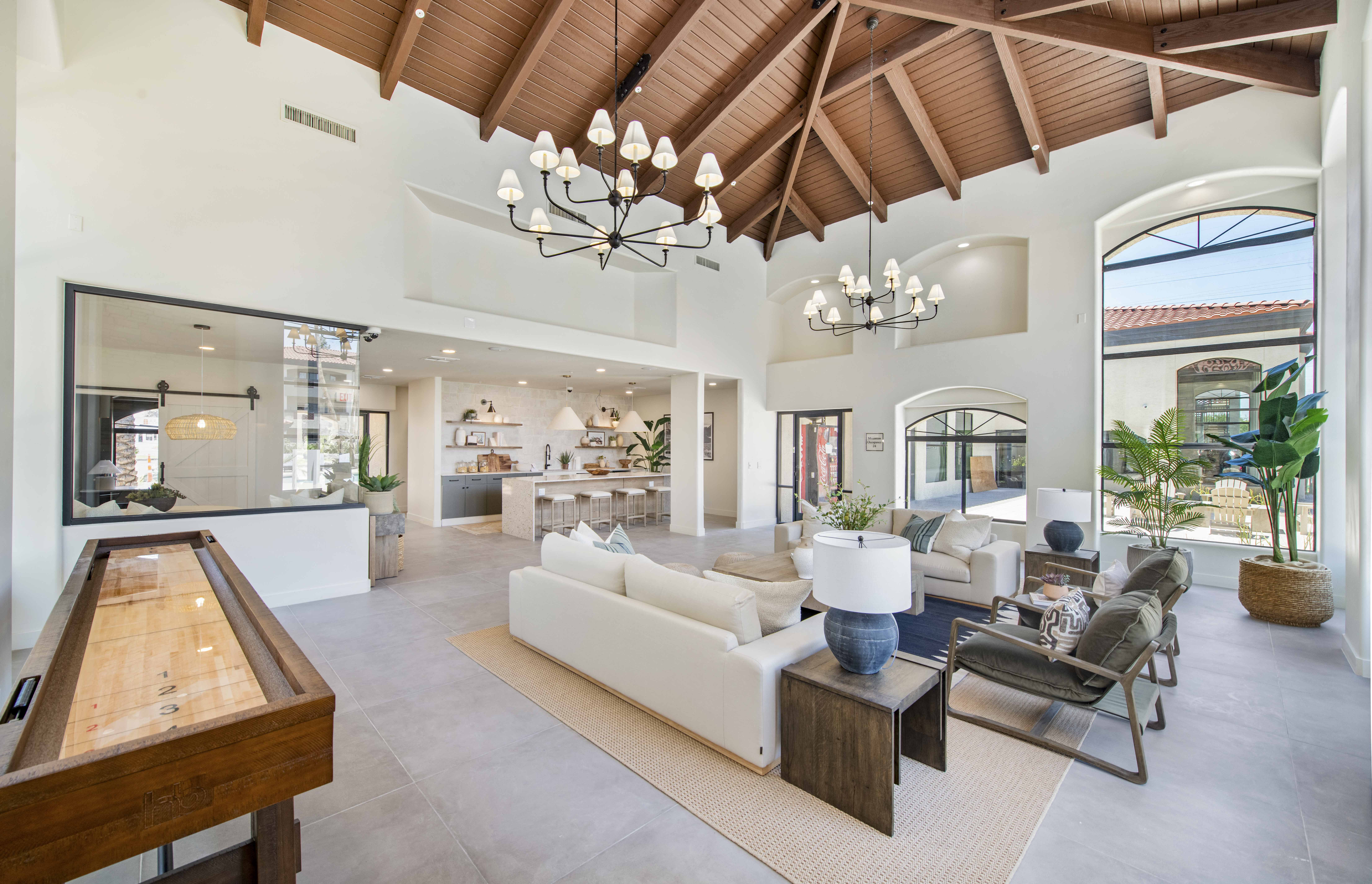 a living room with a white couch and a table