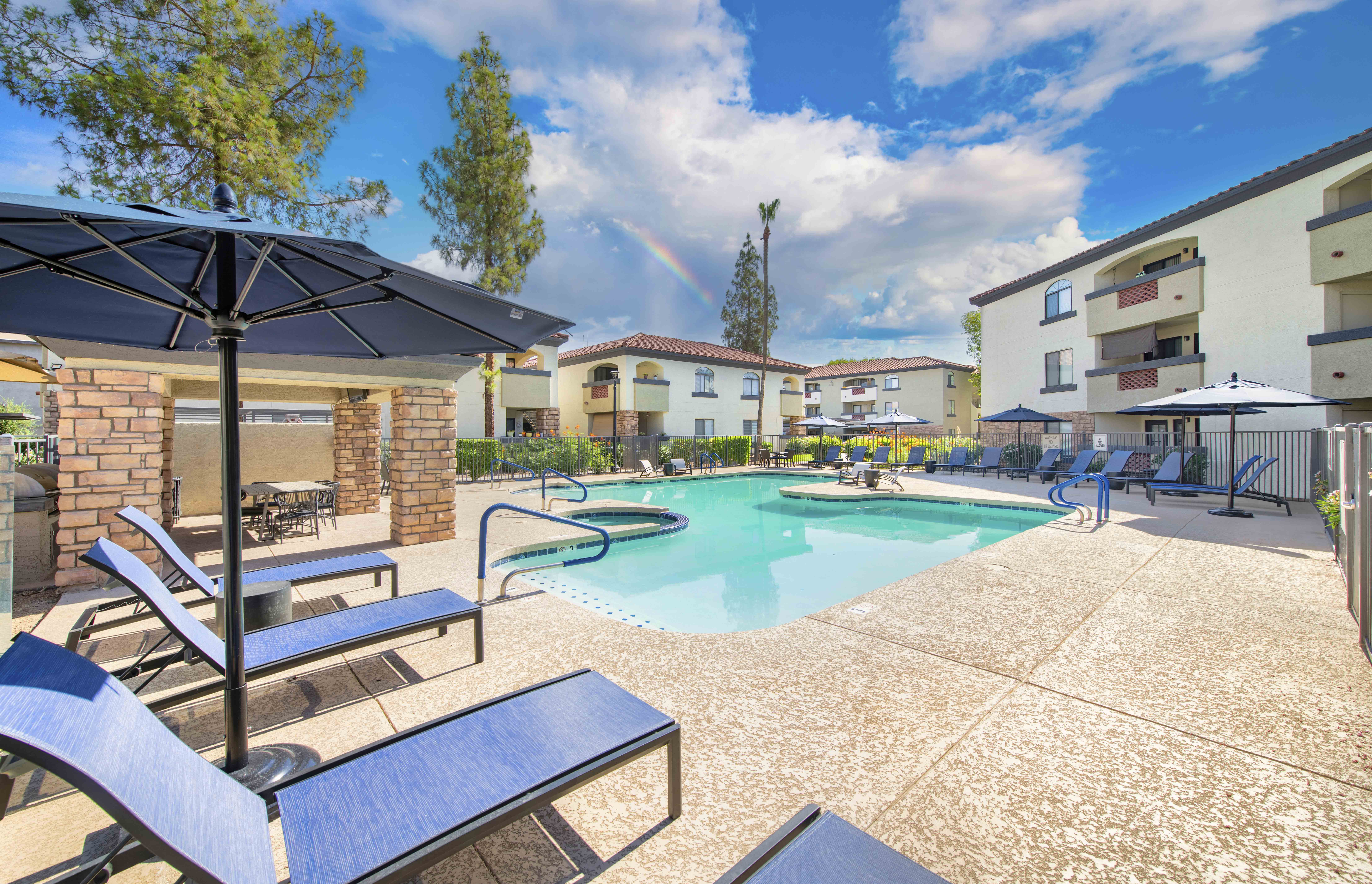our apartments offer a swimming pool and patio with umbrellas