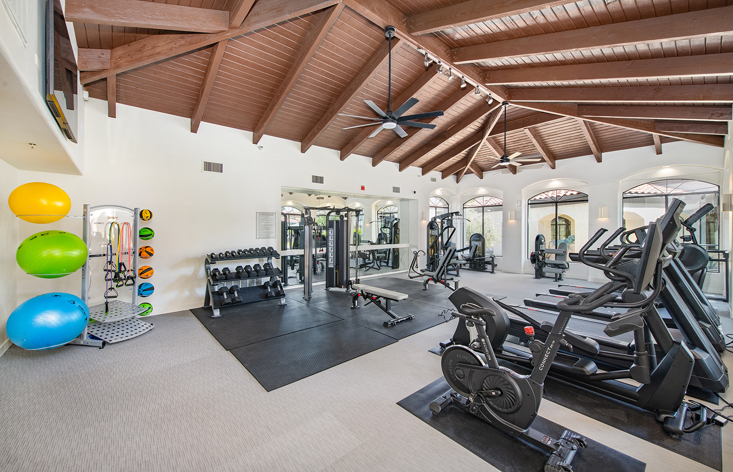 a gym with treadmills and other exercise equipment at the resort at governors crossing