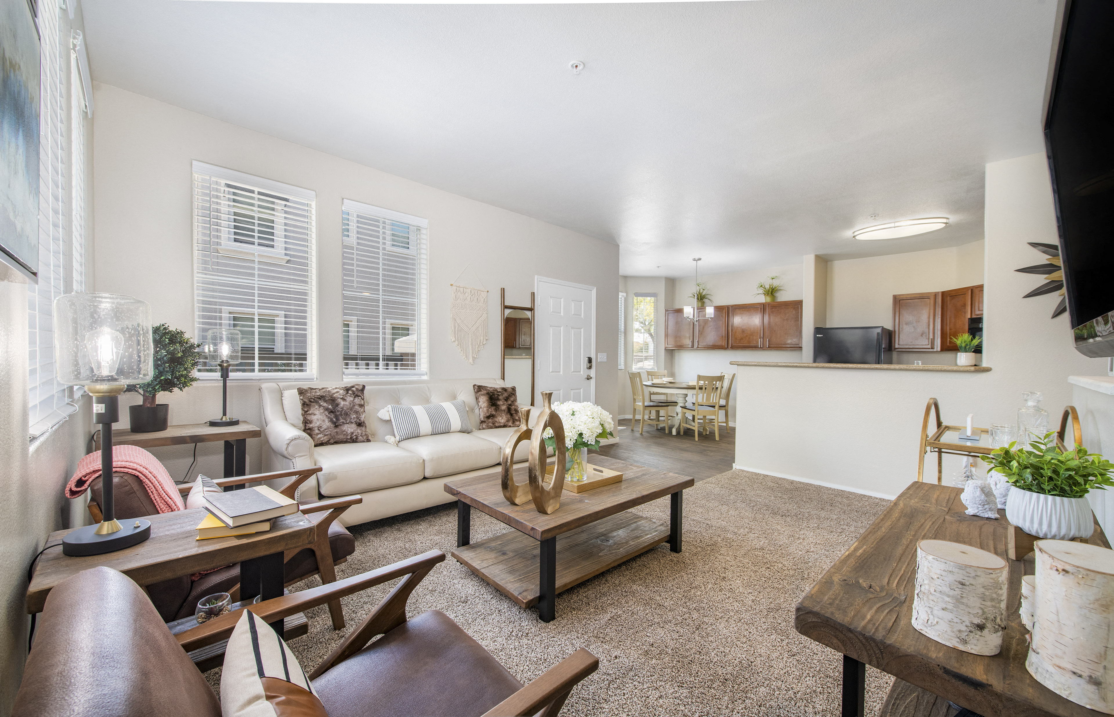 a living room with a couch and a table
