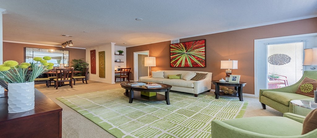 a living room with a couch and a table