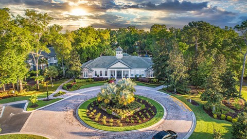 an aerial view of a house with a garden in front of it