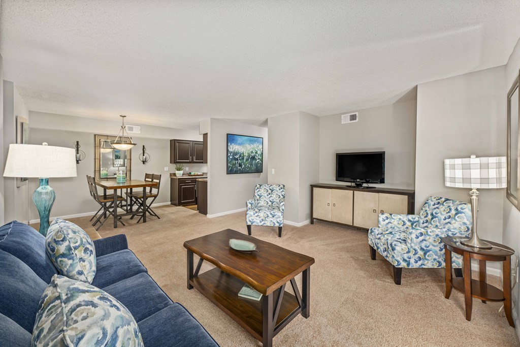 a living room with a couch and a table