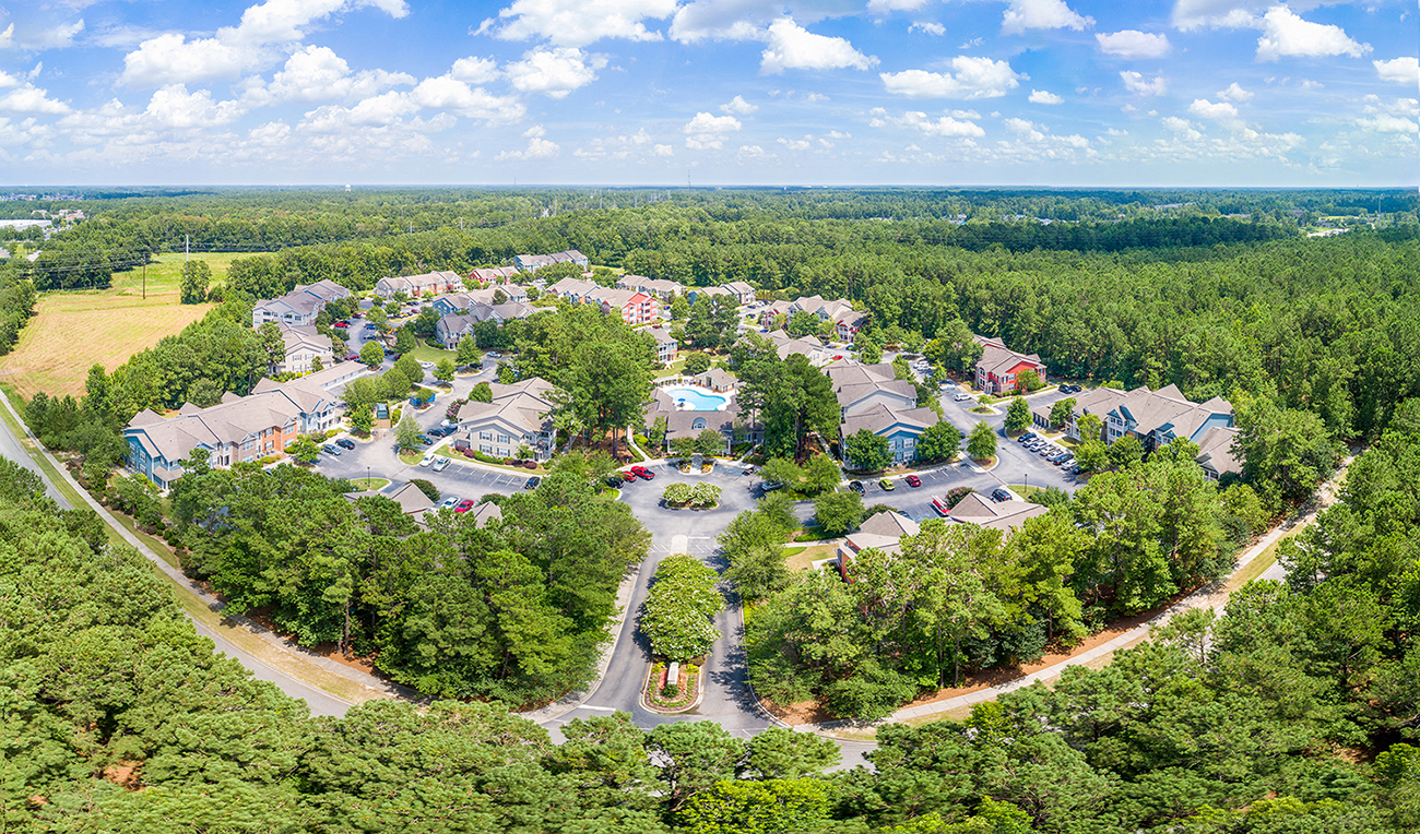 a aerial view of a neighborhood with houses and trees