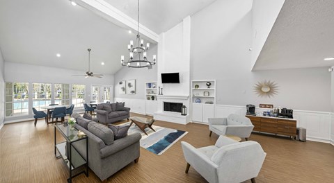 A modern living room with a fireplace and a television.