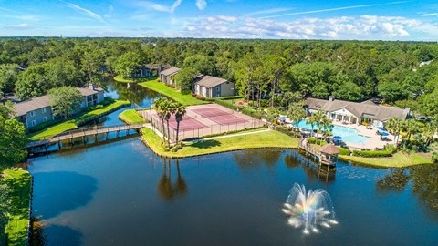 arial view of homes on the water with a body of water