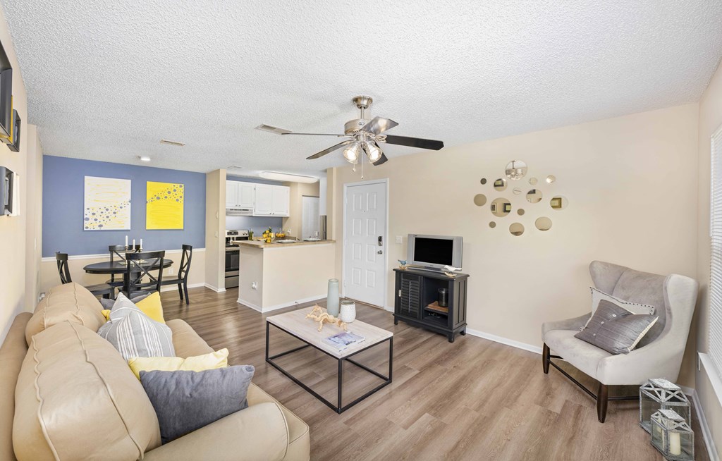 a living room with a couch and a table