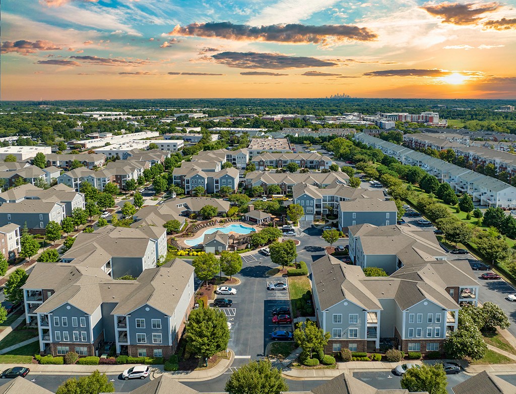an aerial view of a neighborhood with houses and trees