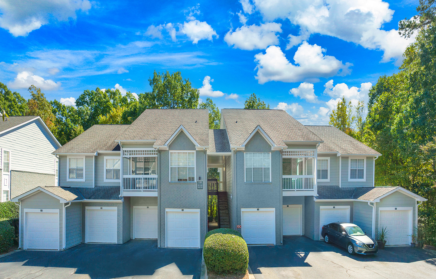 a house with a car parked in front of it