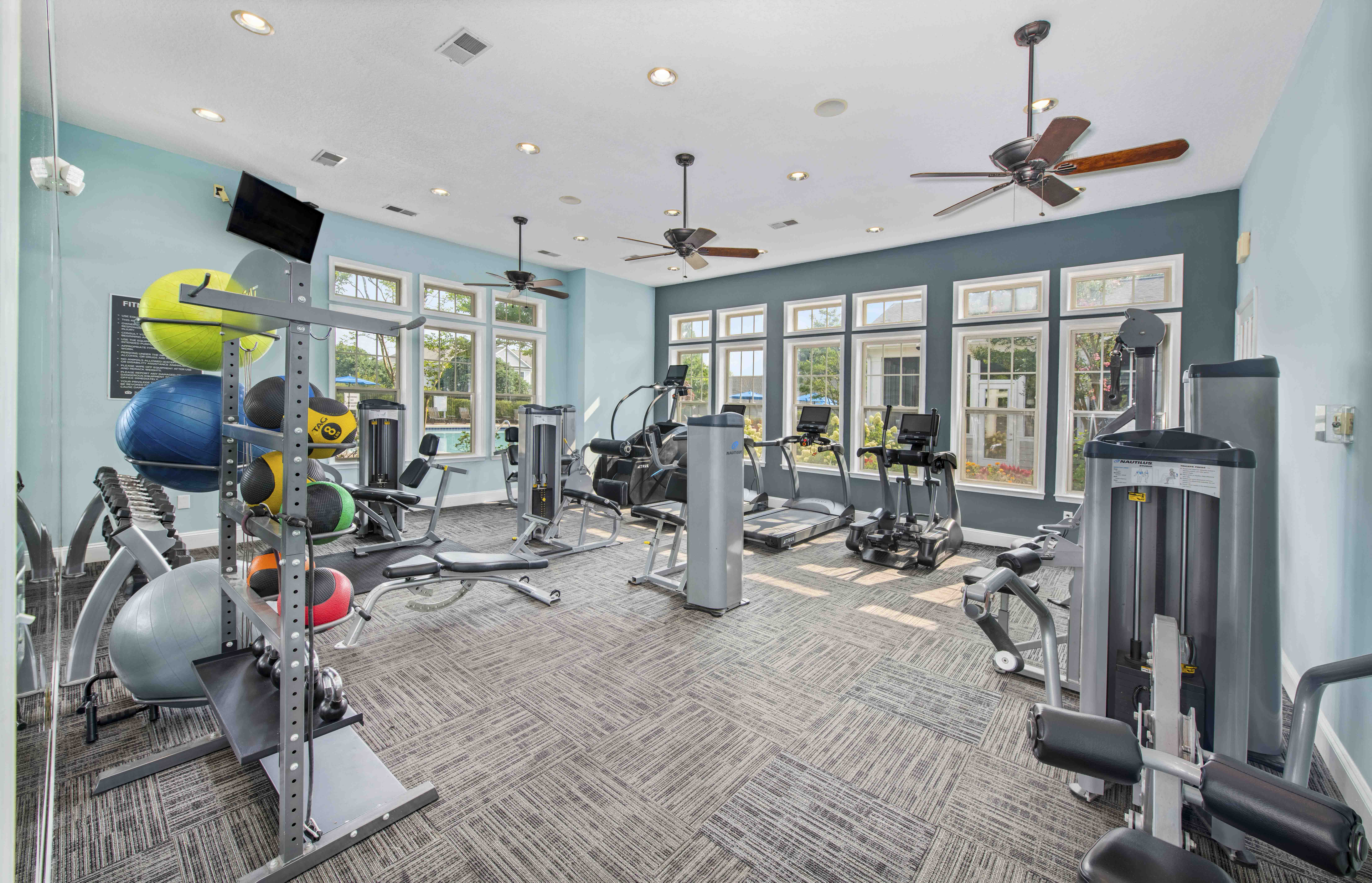 the gym is equipped with a variety of weights and cardio equipment
