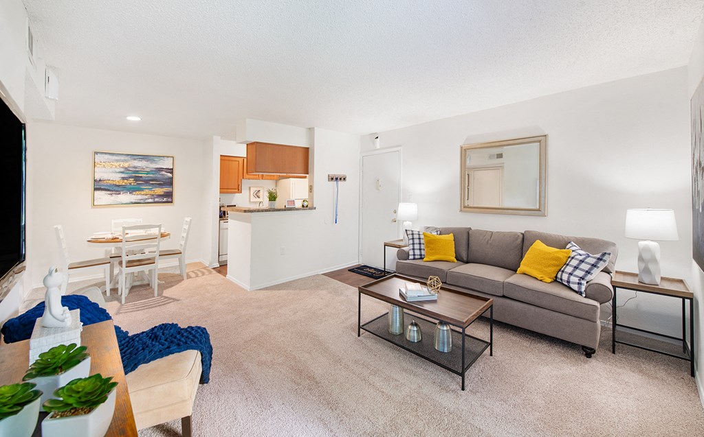 a living room with a couch and a table