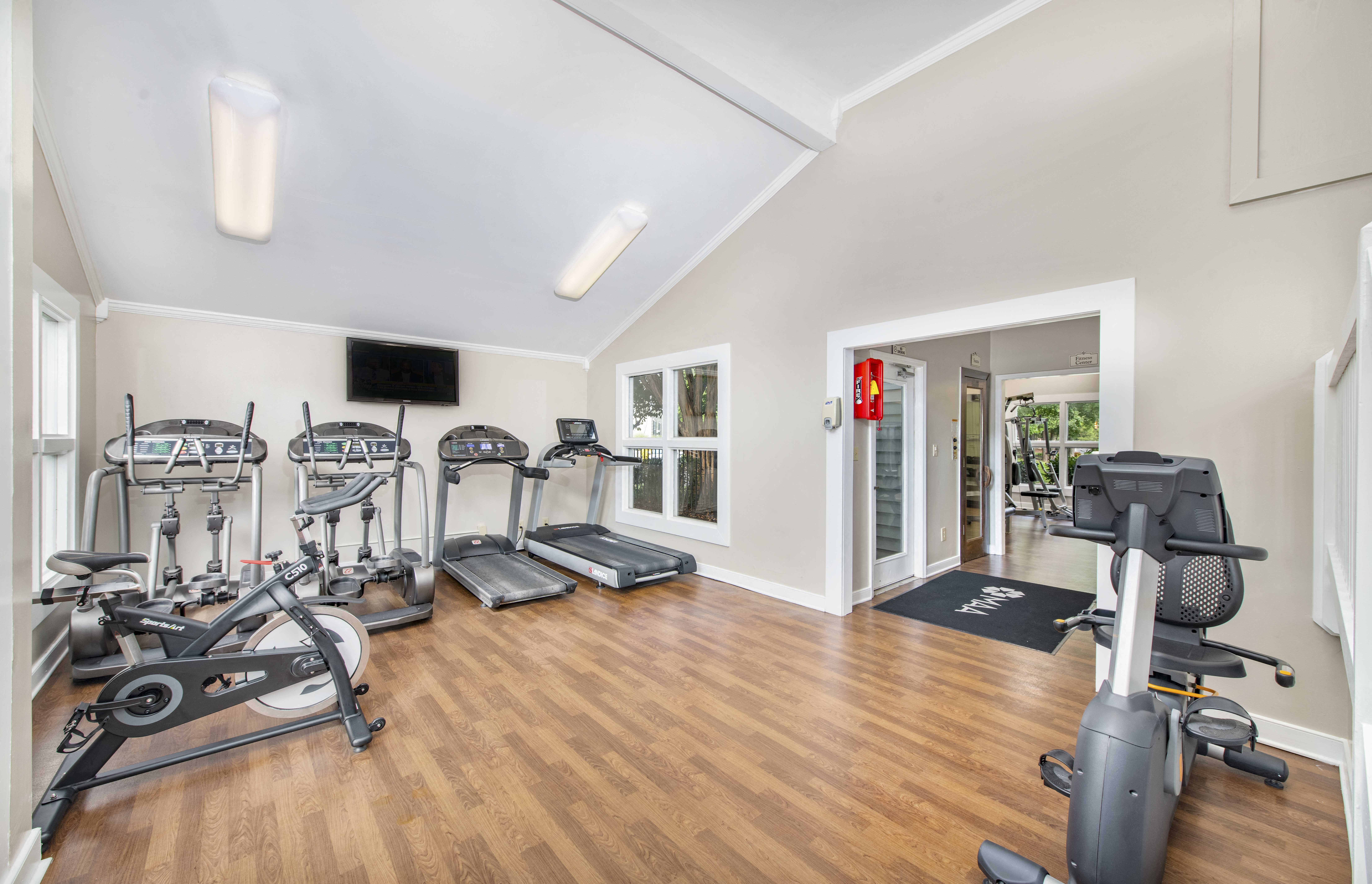the gym at 1861 muleshoe road has cardio equipment and wood floors